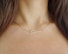 When it comes to name jewelry, this classic has it all. This stunning name necklace features a sleek box chain and is hand-crafted from premium 14k or 10k gold. Adorned with a sparkling diamond set into the nameplate, it adds a touch of elegance to any look. Perfect for personalizing your style or as a meaningful gift! Rendered in a stunning script, it is perfect for showcasing your name, the name of a loved one, your handwriting, your signature, or even a favorite word to inspire or motivate when needed.  100% Handmade in Boca Raton, FL - Each necklace is made to order.  Chain Style: Box Chain. Around 0.8mm Diamond: Natural Diamond Available in 14K, 10K - White Gold, Yellow Gold, and Rose Gold.  Perfect gift for any occasion and any age - Religious holidays, Confirmation, baptism, Christm Personalized Nameplate Jewelry With Polished Finish, Gold Sterling Silver Name Necklace With Polished Finish, Gold Polished Sterling Silver Name Necklace, Classic Yellow Gold Name Necklace, Classic Yellow Gold Name Jewelry, Classic Pendant Name Necklace For Anniversary, Classic Yellow Gold Sterling Silver Name Necklace, Classic Jewelry For Mother's Day With Polished Finish, Formal Fine Jewelry Name Necklace In White Gold