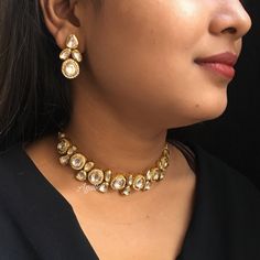 *PRODUCT DETAIL* *Material: Brass *Plating: 22K Antique Gold Plated *Stone: Semi Precious Kundan & pearls *DIMENSIONS * *Necklace: Weight 62 gm, Height: 0.8 *Earrings: Weight 8 gm Each, Length 1.25 Inches, Width 0.8 Inches *ABOUT PRODUCT* *Beautiful Jadau Kundan Necklace Set with Pearl Highlights. *Style Tip : Exclusively Pretty Necklace set to get you noticed. *DISCLAIMER* *Product & color may slightly vary due to photographic lighting sources or your screen settings. Traditional Yellow Gold Kundan Necklace For Reception, Elegant American Diamond Tikka For Festive Occasions, Elegant Festive American Diamond Tikka, Festive American Diamond Tikka, Dazzling Kundan Jewelry For Festive Occasion, Elegant Heavy Kundan Necklace In Yellow Gold, Bollywood Style Jewelry With Rose Cut Diamonds, Bollywood Style Rose Cut Diamond Jewelry For Reception, Dazzling Hand Set Bridal Necklace For Festive Occasions