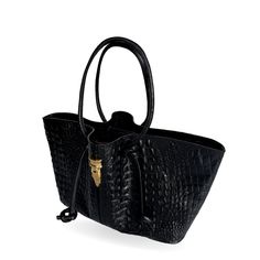 This tote bag is a statement piece that effortlessly elevates your style. Crafted from a glossy luxurious crocodile-textured leather, it offers a touch of sophistication and elegance.  Its spacious interior, complete with compartments and pockets, offers ample room for your daily essentials. The knotted strap is adjustable to any length, perfect for super comfortable shoulder wear and its closure consists in two golden clasps. Exterior: Bovine black leather with lizard texture Interior: cotton l Animal Print Party, Stocking Fillers For Him, Stocking Fillers For Her, Holiday Party Outfit, Forever Jewelry, Women Accessories Bags, Jewelry Ring Box, Party Accessories, Embossed Leather