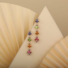 The colorful Confetti Veil earrings are chic and fun earrings with an intricate design and an out-of-the-box attitude. These flamboyant and colorful earrings can complement almost any attire, especially monochromes that need a pop of color. This is the perfect gift for the person in your life who wants more out of life. Luxury Multicolor Earrings With Gemstone Accents, Multicolor Gemstone Accented Fine Jewelry Earrings, Luxury Multicolor Earrings For Evening, Multicolor Gemstone-accented Fine Jewelry Earrings, Formal Multicolor Gemstone Earrings, Multicolor Gemstone Accented Earrings For Formal Occasions, Luxury Multicolor Earrings For Formal Occasion, Elegant Multicolor Earrings For Evening, Multicolor Fine Jewelry For Party