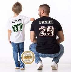 Looking for a Football / NFL themed shirt for the birthday boy or just want a custom shirt to wear at the game? Look no further, because we've got you covered! Your little one will love sporting this custom name shirt either on their birthday or at the big game or even both! With cool colors and an ultra-soft feel, this personalized shirt is sure to become a favorite for any Football fan, young or old. And thanks to our eco-friendly direct-to-garment printing, you can feel good about your purchase. This is the perfect addition to any Football themed birthday party or gift for the ultimate NFL enthusiast! ~How to Order~ 1️⃣ If you are ordering 2 or more shirts, be sure to place individual items in the cart 2️⃣ Select the Size and Color from the drop down menu 3️⃣ Use either the 'Personaliza Father's Day Sports Event T-shirt With Name Print, Customizable Team Spirit T-shirt For Birthdays, Customizable Team Spirit Tops For Birthday, Customizable Team Spirit T-shirt For Birthday, Personalized Crew Neck T-shirt For Fans, Personalized Fan Merchandise Crew Neck T-shirt, Father's Day Letter Print T-shirt, Customizable School Spirit T-shirt For Birthday, Personalized Crew Neck Tops For Fan Merchandise