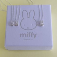 DESCRIPTIONThis adorable little Sterling Silver Miffy Rabbit Charm Necklace is lovely and adds a fun, delightful touch of character to any outfit.Beautifully handcrafted in the UK from the highest quality 925 sterling silver, this charming, larger version of the classic Miffy head charm necklace in sterling silver; simple and stylish, the chain threads through loops concealed behind Miffy's ears allowing the head to slide freely. Our Sterling Silver Miffy Necklace comes attached to a silver chai Cute Sterling Silver Pendant Charm Necklaces, Cute Sterling Silver Pendant Charm Necklace, Cute Silver Sterling Silver Charm Necklaces, Cute Nickel-free Sterling Silver Necklaces, Cute Hypoallergenic Silver Charm Necklaces, Playful Silver Charm Necklaces, Cute Charm Necklaces As Gift, Handmade Cute Sterling Silver Charm Necklaces, Cute Silver Hypoallergenic Necklace