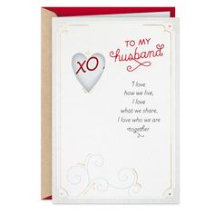 a card with an xo heart on it and the words to my husband written in red