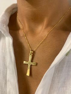 Gold Men's Cross Necklace made of Gold Vermeil: 18k Gold over Solid 925 Sterling Silver ☞ made to last.Matching Ring & Matching Earrings - please ask meDetails:• Gold Men's Cross Necklace• Dimensions: Pendant Height 40mm, Width 21mm• Free Complimentary Chain• 18k Gold VermeilSKU TE-121 Gold Crucifix Jewelry Stamped 14k, Yellow Gold Plated Crucifix Jewelry, Gold Crucifix Jewelry Gift, Classic Pendant Jewelry With Shiny Finish, Hallmarked Yellow Gold Cross Jewelry, Hallmarked Yellow Gold Crucifix Jewelry, Spiritual Polished Crucifix Jewelry, Hallmarked Spiritual Crucifix Jewelry, Spiritual Hallmarked Crucifix Jewelry