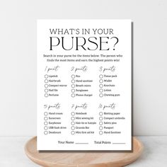 what's in your purse? sign on a wooden stand with a white background