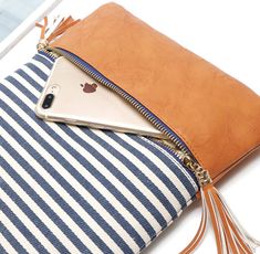 The small comfortable crossbody bag makes the perfect gift for any occasion. It will dress up your clothing when going out shopping, work, travel, or on vacations 1. Size: 10.24×9.05 in 2. Material: canvas+pu 3. Adjustable shoulder strap with 53.15 in 4. The stylish crossbody bag features an adjustable long shoulder strap and tassel. The zipper closure & front zipper is a functional pocket Summer Canvas Shoulder Bag For On-the-go, Summer Travel Shoulder Bag With Cell Phone Pocket, Chic Summer Bags With Cell Phone Pocket, Chic Crossbody Phone Bag For Summer, Chic Summer Crossbody Phone Bag, Summer Crossbody Shoulder Bag With Cell Phone Pocket, Trendy Travel Clutch Phone Bag, Trendy Travel Phone Clutch Bag, Casual Clutch With Zipper Closure For Everyday Use