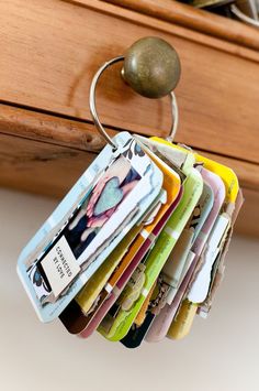 a close up of a wallet hanging from a hook