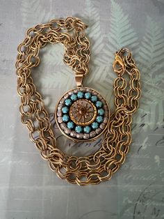 "This upcycled pendant locket is comprised of remnants of vintage jewelry.  The vintage chunky gold tone chain has double links. The original box clasp has been replaced by a lobster clasp. The extra large oval locket still functions to hold your photos close to your heart.  Measurement: locket 1 1/2\" x 1 1/2\"                            Chain 24\" This item will be gift wrapped and shipped free of charge." Vintage Antique Gold Jewelry With Gold Chain, Vintage Jewelry Medallion With Gold Chain, Vintage Locket Necklace With Round Pendant, Vintage Brass Jewelry With Gold Chain, Bohemian Gold Locket Necklace With Vintage Charm, Vintage Handmade Gold Locket Necklace, Vintage Metal Locket Necklace, Vintage Metal Locket Necklace With Charm, Gold Bohemian Locket Necklace With Vintage Charm