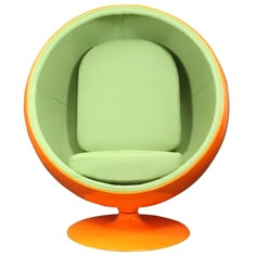 an orange and green ball chair sitting in front of a white background