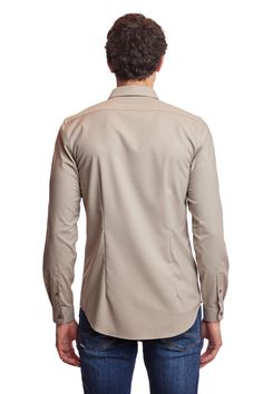 An elegant slim-fit spread collar shirt in oatmeal beige. Poly-rayon stretch gives this shirt a comfortable, yet elegant appearance that can be worn all year long. This shirt can be worn with a variety of tops and bottoms.PRODUCT DETAILS: style 6517W slim fit dress shirt spread collar printed fabric poly-rayon stretch blend dry clean only imported