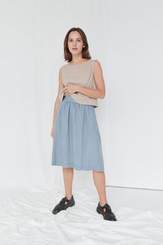 "SIZING & FIT This skirt is loose. Before placing an order, check the approximate measurements of the finished garment given below. Model is 5′6″ (170cm) tall with an 80cm/31″ bust, 68cm/26″ waist, 91cm/35″ hip, and she is wearing an XS in sea green. XS Length ± 65cm | 25.6\" Unstretched waist ± 60cm | 23.6\" Hips ± 130cm | 51.2\" Hem width ± 160cm | 63\" S-M Length ± 65cm | 25.6\" Unstretched waist ± 68cm | 26.8\" Hips ± 138cm | 54.3\" Hem width ± 168cm | 66.1\" L-XL Length ± 65cm | 25.6\" Linen A-line Pleated Skirt, Spring Linen A-line Skirt, Flowy Linen Skirt For Summer, Summer Linen Dress With Lined Skirt, Summer Linen Dresses With Relaxed Skirt, Linen Midi Skirt With Lining, Spring Linen Gathered Skirt, Linen Pleated Midi Skirt, Linen Flowy Dress With Lined Skirt