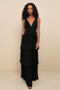 Mesmerizing Essence Black Pleated Backless Tiered Maxi Dress Elegant V-neck Pleated Dress With Ruffles, Evening Tiered Ruched Maxi Dress, Ruched Tiered Maxi Dress For Evening, Tiered Ruched Maxi Dress For Evening, Black Evening Dress With Accordion Pleats, Elegant Black Pleated Dress With Accordion Pleats, Black Pleated Dress With Accordion Pleats For Evening, Black Accordion Pleated Dress For Evening, Flowy Evening Dress With Pleated Back