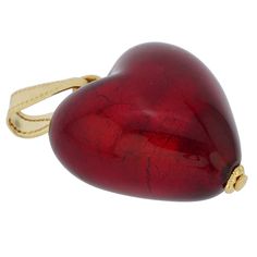 The unique beauty of Venice comes to life in this classic Murano Glass Heart Pendant. The perfect jewelry piece for everyday or a special day, this handcrafted ruby red heart pendant will make you feel elegant and stylish wherever your journey takes you. This Murano pendant also makes a wonderful gift for a special woman in your life. Measurements: The pendant measures 3/4 x 3/4 inch. It comes with an attractive velvet pouch, and the certificate of authenticity. Because each Murano Glass piece i Luxury Red Jewelry With Heart Charm, Elegant Red Jewelry With Heart Charm, Luxury Red Jewelry For Valentine's Day, Elegant Heart Necklace For Keepsake, Luxury Red Heart Pendant Jewelry, Luxury Red Heart-cut Jewelry, Luxury Red Heart Pendant Necklaces, Luxury Red Heart Cut Jewelry, Elegant Heart Necklace For Valentine's Day Keepsake