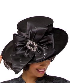 Giovanna Deluxe Church Hat Style: HG1103 Color: Black Elegant bow adorned hat featuring stone embellishment. Crown Circumference: 23" First Lady Church Suits, Church Dresses For Women, Church Suits And Hats, Women Church Suits, Occasion Hats, Black Church, Women Church, Church Hat, Church Suits