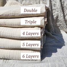 four different types of linens stacked on top of each other with labels reading double triple 4 layers 5 layers 6 layers