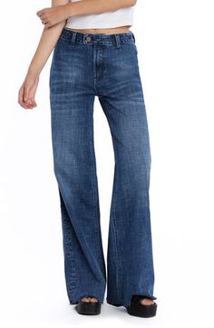 Tailored with an easy-fitting wide leg, these stretch-denim jeans feature a flat front and two back patch pockets. 32" inseam; 23" leg opening; 10 1/4" front rise Zip fly with button closure Back patch pockets 69% cotton, 27% REPREVE® recycled polyester, 3% rayon, 1% spandex REPREVE recycled polyester is made from 100% post-consumer recycled plastic bottles Machine wash, tumble dry Imported Jeans For Women In Their 40s, Types Of Pants For Women, Types Of Jeans For Women, Wide Flare Jeans, Jeans For Work, Low Rise Wide Leg Jeans, 70s Pants, Mid Rise Straight Leg Jeans, 80s Jeans