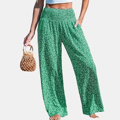 Step out in style with our Ditsy Smocked Waist Wide Leg Pants! These fashionable pants feature a ditsy floral print and a flattering smocked waist design, combining comfort with trendiness. The wide leg silhouette adds a touch of elegance and movement to your outfit, perfect for both casual outings and more dressed-up occasions. Product code: CAA02D4C009UC,CAA02D4C009RC Summer Vacation Floral Print Harem Pants, Summer Floral Print Harem Pants For Vacation, Summer Vacation Harem Pants With Floral Print, Floral Print Beach Bottoms, Floral Print Wide Leg Harem Pants For Vacation, Non-stretch Floral Print Vacation Bottoms, Casual Green Harem Pants For Vacation, Casual Floral Print Harem Pants For Summer, Casual Floral Print Pants For Vacation