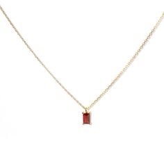 A dainty stone and delicate metallic chain are combined to create this Gold Pendant Necklace in red garnet, your new favorite wear-anywhere accessory. Garnet is the birthstone of January. 14k gold plated over sterling silver H2O sensitive. Before showering or working out, remove your plated jewelry. Clean your piece by buffing gently with a dry cloth and store it in your pouch. High quality lab created emerald stone Minimalist Red Gemstone Birthstone Necklace, Red Minimalist Birthstone Necklace, Garnet Necklace Gold, Lucy Van Pelt, Baguette Necklace, September Birthstone Jewelry, Garnet And Gold, Nature Necklace, July Birthstone Jewelry