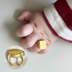 Graduation Cap Gold Baby Ring 24K 0.999 Pure 3.75g 한돈 Imagine your baby's graduation day in his/her life  The gold ring is the traditional Korean gift to wish a baby good health and fortune in life on their 1st birthday or 100days party. It can be engraved on top of the ring (3 up to lines) -sample 1) 하온아 2) 건강하게 자라거라 3) 훌륭한 사람이 되길 💕Package: All items are in a gift case with certification and sent in a fortune pouch to ensure safe delivery to every customer.                         Please choos Baby Gold Rings, Baby Ring, Baby Rings, Medical Bracelet, Traditional Korean, Gold Baby, Graduation Day, Graduation Cap, Pure Gold