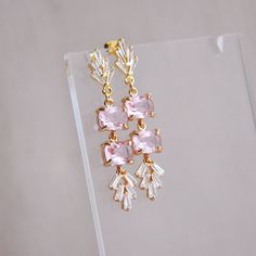 "Pink Earrings // Art Deco Earrings // Fan Earrings // Statement Earrings // Boho Bridal Earrings // Bridesmaids Earrings // Pink Wedding // Birthday Gift Gorgeous pink earrings created with faceted light pink glass and accented with cubic zirconia for added sparkle. These art deco inspired statement earrings are created with gold plated sterling silver earring posts and gold plated butterfly clutches. Whether searching for the perfect pink wedding earrings for your special day or for your next Wedding Dangle Cluster Earrings, Delicate Dangle Crystal Party Earrings, Delicate Dangle Crystal Earrings For Party, Handmade Pink Crystal Earrings For Wedding, Dangle Cluster Earrings For Wedding, Pink Elegant Clip-on Earrings For Anniversary, Delicate Pink Party Earrings, Elegant Pink Clip-on Earrings For Anniversary, Handmade Dangle Earrings For Bridesmaids