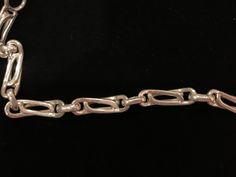 Beautiful vintage sterling silver chain link bracelet with a snap-lock closure. The bracelet has a beautiful design. It measures 8.25 inches in length. There are a few minor superficial scratches. Formal Chain Link Bracelet With Hook And Links, Classic Sterling Silver Bracelet With Hook And Links, Hallmarked Sterling Silver Link Bracelet, Formal Sterling Silver Bracelet With Hook And Links, Sterling Silver Bracelet With Lobster Clasp For Formal Occasions, Formal Sterling Silver Bracelet With Lobster Clasp, Silver Chain Link Bracelet For Formal Occasions, Formal Silver Chain Bracelet With Oval Links, Formal Oval Link Chain Bracelet