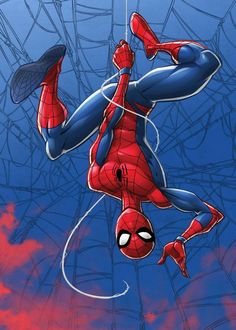 a spider - man hanging upside down in the air with his hands on his hips