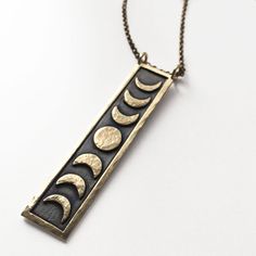 Celestial Moon-shaped Jewelry For Meditation, Celestial Moon Jewelry For Meditation, Celestial Crescent Jewelry For Meditation, Celestial Crescent Bronze Jewelry, Mystical Sun And Moon Brass Jewelry, Mystical Brass Jewelry With Sun And Moon Design, Celestial Moon-shaped Bronze Jewelry, Celestial Bronze Moon Jewelry, Bronze Moon-shaped Celestial Jewelry