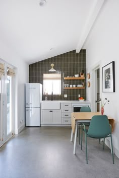 the kitchen is clean and ready to be used for cooking or dining, while still in use