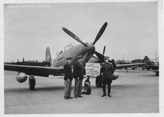 two men standing in front of an airplane with the caption'ceremony for the 500th aircraft sent to russia through lend leases