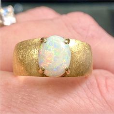 14k Yellow Gold Genuine Opal Thick Dome Ring Vintage Estate Solid 14k Yellow Gold Genuine Natural Opal Brushed (Textured) Dome Band Size - 8.5 Professionally Cleaned, Buffed, And Polished Gift Box Included October Birthstone Weight - 8.45 Grams Absolutely Stunning Cabochon Cut Oval Genuine Opal On A Thick, Brushed 14k Yellow Gold Domed Band. Beautiful Flashes Of Color - True Opal (Not Doublet Or Triplet). Heavy, Well Made Ring With Brushed Textured Band. Dome Style Ring. Vintage Estate, Jewelry, Yellow Gold Polished Opal Ring, Anniversary Opal Ring Stamped 14k In Oval Shape, Classic Opal Jewelry With Polished Finish, Fine Jewelry 14k Gold Opal Ring With Polished Finish, 14k Gold Opal Ring With Polished Finish, Fine Jewelry Yellow Gold Opal Ring With Polished Finish, Oval Opal Ring In Yellow Gold Stamped 14k, Yellow Gold Opal Ring With Polished Finish, Formal 14k Gold Polished Opal Ring