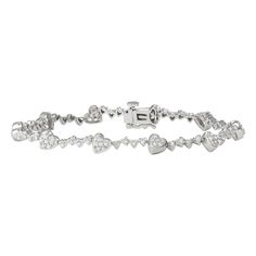 "Featuring a heart motif lined with dazzling, round-cut diamonds, this sterling silver bracelet beautifully accents your favorite outfits. Featuring a heart motif lined with dazzling, round-cut diamonds, this sterling silver bracelet beautifully accents your favorite outfits. Length: 7 in. Clasp: safety Metal: sterling silver Plating: rhodium Finish: polished Packaging: boxedDIAMOND DETAILS Total weight: 1 ct. Shape: round Setting: prong Gemstones may have been treated to enhance their appearanc Sterling Silver Heart Bracelet For Anniversary, Diamond Heart Jubilee Bracelet, White Gold Diamond Heart Bracelet, Fine Jewelry Silver Heart Diamond Bracelet, Fine Jewelry White Gold Heart Bracelet With Cubic Zirconia, White Gold Diamond Heart Bracelet With Heart Charm, Valentine's Day Heart Shaped Cubic Zirconia Tennis Bracelet, Valentine's Day White Gold Heart Diamond Bracelet, White Gold Heart Diamond Bracelet For Valentine's Day