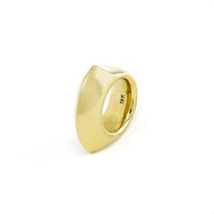 For Jenna Blake’s founder, Jenna Grosfeld, collecting is an art, and the source of her vintage-inspired, yet truly timeless jewelry pieces. Confidence in color, a “more is more” philosophy, and mid-century modern design motifs are the hallmarks of this stunning collection. It does not get more elegant than the shapely Kelly Ring, with its solid appearance and architectural angles. A subtle stunner. Product Details 18 karat yellow gold. Care Instructions Keep away from liquids and solvents. Size Modern Formal Jewelry With Iconic Design, Modern Concave Dome Ring For Formal Occasions, Modernist Open Signet Ring For Formal Occasions, Vintage Concave Jewelry With Polished Finish, Modernist Concave Jewelry With Polished Finish, Vintage Formal Jewelry With Unique Design, Vintage Jewelry With Unique Design For Formal Occasions, Vintage Polished Dome Ring, Vintage Dome Ring With Polished Finish