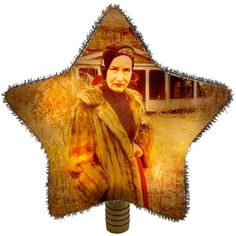 a star shaped object with a photo of a woman in fur coat on it's side