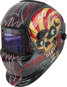 a helmet with a skull on the side and red flames painted all over it's face