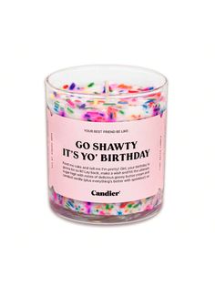 a candle that is filled with sprinkles and the words go shawty it's yo birthday