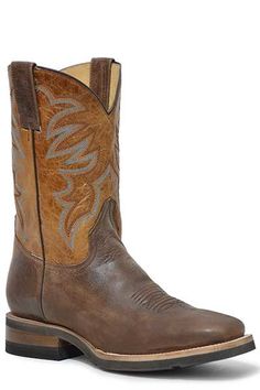 Roper Men's Burnished Brown Work It Over Boot 09-020-9204-8442 BR The "Work It Over" boot is classic cowboy style that can tackle barn chores, long drives, or even a day at the mall with the family. It is comfortable and sturdy. Men's square toe, 11" shaft, REST insole, GEO outsole boot in burnished brown leather vamp and marbled tan leather shaft. WORK IT OVER Square Toe Burnish Brown Leather Vamp Marbled Tan Leather Shaft 11" Shaft Double Welt All Leather Lining Leather Walking Heel GEO Outsol Farm And Ranch, Long Drives, Classic Cowboy, At The Mall, Cowboy Style, Work It, Western Wear, Tan Leather, Cowboy Boots