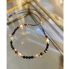 Black Tourmaline & Garnet Cord Bracelet. Delicate Silk Beaded - Etsy Crystal Bracelet Design, Handmade Black Pearl Bracelet As Gift, Handmade Black Pearl Bracelet Gift, Handmade Black Pearl Bracelet For Gift, Cristal Bracelet, Silk Bracelet, Bracelets Handmade Diy, Bracelets Design, Garnet Bracelet