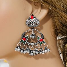 Multicolor Oxidized Silver Chandbali Earrings/ German Silver Party earrings/ Silver Oxidized Ethnic Earrings/ Indian Tribal Earrings - Length: 2.85 Inches - Comes with Push back Closure - Lightweight Earrings - Contemporary earrings with multicolor simulated stones in silver finish. - Very Elegant and stylish, these earrings can be paired with any traditional Indian or Western Attire depending upon the occasion and the    theme.  - The base is pure brass (90%) and pure 92.5 silver (10%) which ma Multicolor Temple Jewelry Earrings For Festival, Traditional Multicolor Pierced Earrings, Bohemian Earrings With Peacock Design For Celebrations, Bohemian Peacock Design Earrings For Celebration, Silver Bohemian Hoop Earrings For Celebration, Bohemian Metal Earrings With Peacock Design, Bohemian Peacock Design Danglers For Festivals, Bohemian Peacock Danglers For Festivals, Bohemian Multicolor Earrings With Oxidized Finish