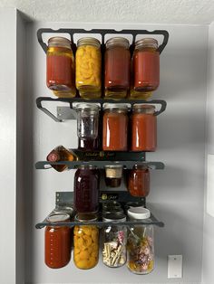 a refrigerator filled with lots of different types of food and condiments on shelves