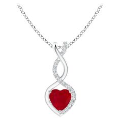 A diamond studded strip entwines with a lustrous metal strip to form an ornate infinity. Floating amid the graceful infinity is a heart-shaped bold red ruby in a prong setting. The sparkling diamonds infuse a captivating edge to this platinum infinity twist pendant. Infinity Heart, Bracelet Love, American Modern, Heart Pendant Diamond, Red Ruby, Natural Ruby, Baccarat, Locket Necklace, Sparkle Diamonds