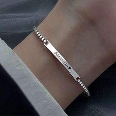 "Valentine's gift for girlfriend , gift for her -Personalized Solid 925 Sterling Silver ID Bracelet , Custom Women ID Bracelet Material : Solid 925 Sterling Silver Bracelet  Weight :10 g Length:6.8\" + 0.9\" =7.7\" Please put : \"Blank\" here if selected without the engraving option. We supply up to 3 initials engraving on the side of front , the initials order will be:  first, middle , last. or one line engraving is no more than 21 characters including spaces. One font available , Please see the engraving sample from the Main sample picture. Notice : the color on the finished engraved item sometimes may have a little difference, because of the different Computer screens. It is great gift for mom, gift for sister, gift for girlfriend , gift for wife, gift for grandma, gift for best friend Elegant Personalized Sterling Silver Bracelet For Valentine's Day, Mother's Day Name Bangle Bracelet, Stainless Steel Chain Bracelet Gift, Personalized Silver Heart Bracelet, Classic Heart Bracelet For Valentine's Day Gift, Elegant Sterling Silver Name Bracelet For Valentine's Day, Personalized Chain Bracelet As Gift, Sterling Silver Bracelet For Her, Valentine's Day Gift, Engraved Bracelets For Valentine's Day