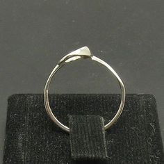 Stylish sterling silver light plain ring,925/1000. Stamped 925. Approximate weight 2.0 grams. Top width 2.2cm. All our jewels are made from solid sterling silver 925/1000 and are carefully crafted by hand in our family workshop. We dispatch your orders in 5 working days, worldwide and the postage is $5. We ship registered priority mail. Please allow 5-7 working days for delivery in Europe and 10-15 working days outside Europe. For any questions - please do not hesitate to contact me! Minimalist Sterling Silver Diamond Ring With Open Band, Silver Minimalist Diamond Ring With Open Band, Nickel Free White Gold Open Band Jewelry, Nickel-free White Gold Open Band Jewelry, Nickel-free Open Band White Gold Jewelry, Minimalist Hallmarked Sterling Silver Rings, Silver Diamond Ring With Simple Design, Nickel Free White Gold Stackable Open Rings, Anniversary Sterling Silver Midi Rings With Open Band