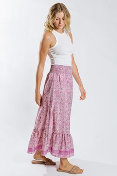 Unleash your adventurous spirit with our Moulika Maxi Flounce Skirt! This bold and beautiful printed skirt is designed to make a statement and elevate your style. Its flowing maxi length adds a touch of elegance, while the flounce detail adds a fun and playful touch. Perfect for taking risks and standing out in a crowd! Style# R5062-99HW-82 Bohemian Flowy Maxi Dress With Gathered Skirt, Relaxed Maxi Skirt With Elastic Waistband For Vacation, Vacation Maxi Skirt With Elastic Waistband, Bohemian Maxi Dress With Gathered Skirt, Flowy Boho Print Tiered Maxi Skirt, Vacation Gathered Maxi Skirt, Spring Printed Maxi Skirt, Flowy Printed Maxi Skirt For Beach, Bohemian Floral Print Relaxed Maxi Skirt