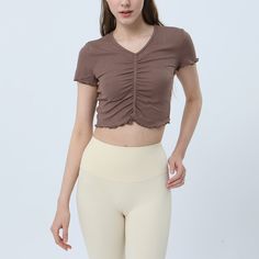 87% Viscose . 13% Spandex Soft. comfortable. skin friendly 4-way stretch. breathable and sweat-wicking Classic V-shape neckline Designed with ruched tailoring for a textured look Cropped designs that allow your skin to breathe all while being cute & trendy. Perfectly pair with your favorite pants. skirts. leggings. joggers. etc. Perfect for both sports activities and daily life Sports Bra And Leggings, Strapless Bandeau, Neckline Designs, Yoga Set, Sports Top, Plus Size Swimwear, Sports Activities, Sports Leggings, V Shape