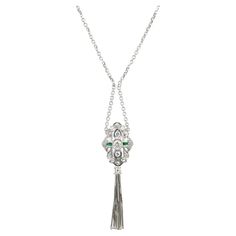 .35 Carat Diamond Synthetic Emerald Gold Tassel Pendant Necklace For Sale at 1stDibs Victorian White Gold Necklaces For Evening, Victorian White Gold Necklace For Evening, Elegant Medallion Necklace With Intricate Design, Victorian Style White Gold Necklace For Evening, Art Deco Platinum Diamond Necklace In Silver, Platinum Pendant Necklace For Evening, Evening Platinum Pendant Necklace, Elegant Engraved Necklaces For Evening, Art Deco White Gold Platinum Necklace