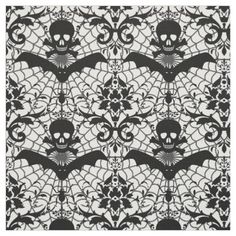 a black and white pattern with skulls on it