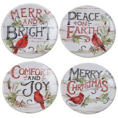 four christmas plates with red birds and holly leaves on them, one is merry and the other is bright