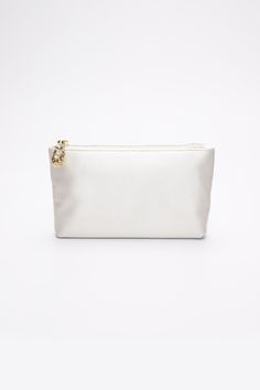 The Mia Clutch with a Ivory Satin Pouch is a chic and elegant acrylic clutch with a modern touch. The exterior is made of the finest Italian acrylic with a beautiful satin zipper pouch interior. Choose from a silver or gold frame to pair perfectly with your preferred metal color. The versatility of The Mia Clutch offers you THREE ways to wear your clutch.Wear it complete with outer acrylic shell and interior zipper pouch or just the acrylic outer shell for a chic peak-a-boo moment or carry just Chic Cosmetic Pouch With Zipper Closure, Chic Cosmetic Bag With Zipper Closure, White Rectangular Case Clutch For Formal Occasions, Elegant Rectangular Clutch With Zipper Pocket, Chic Pouch Clutch With Zipper Closure, Modern Evening Pouch With Zipper Closure, Chic Rectangular Zipper Pouch Cosmetic Bag, Chic Rectangular Cosmetic Bag With Zipper, White Rectangular Clutch For Formal Occasions