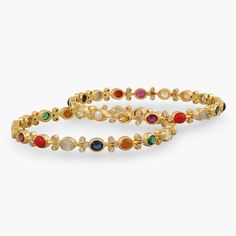 Shimmering Elegance Navaratna Silver Bangles Elegant Jeweled Bracelets For Diwali, Fusion Style Bangle Jewelry With Gemstone Accents, Elegant Stackable Bangle For Festivals, Elegant Jeweled Bracelets For Festivals, Elegant Stackable Bangle For Festive Occasions, Elegant Jeweled Bangle For Festivals, Elegant Jeweled Bangle For Festive Occasions, Elegant Bangle Bracelet For Diwali, Elegant Jeweled Bangle For Celebrations