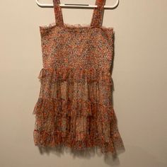 Women’s Floral Ruffled Tiered Dress Brand: Wild Fable Size: Large Retails For $25 Ptp 16” Length 27” Strap Width 2.5” Shell And Lining: 100% Polyester Blue, Red And Orange Floral Print Ruffled In A Tiered Shape Beige Lining Underneath The Dress Has Loops For Hanging On A Hanger Excellent Condition And Like Brand New With No Rips, Stains, Holes Or Tears If You Love This Item But Not The Price, I Am Always Open To Reasonable Offers! Chic Chiffon Sundress With Ruffles, Fitted Chiffon Sundress With Ruffles, Multicolor Tiered Sundress With Ruffles, Multicolor Ruffled Sundress For Brunch, Spring Ruffle Dress With Smocked Back, Spring Flowy Ruched Ruffle Dress, Chiffon Ruffle Sundress For Day Out, Multicolor Ruffled Mini Sundress, Multicolor Sleeveless Ruffle Dress For Summer